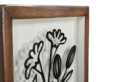 Detail eines handgefertigten Mangoholz-Bildes mit floraler Metall-Deko, nachhaltige Deko